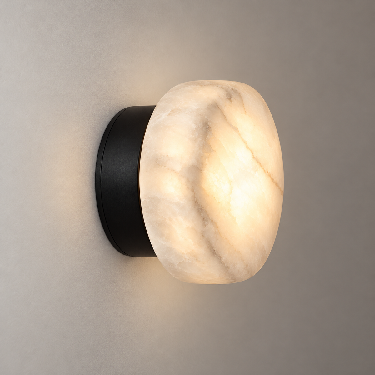 Olmo Alabaster Pebble Wall Light, black finish, studio photo